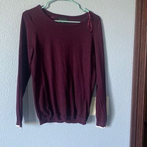 Burgundy sweater with white detail